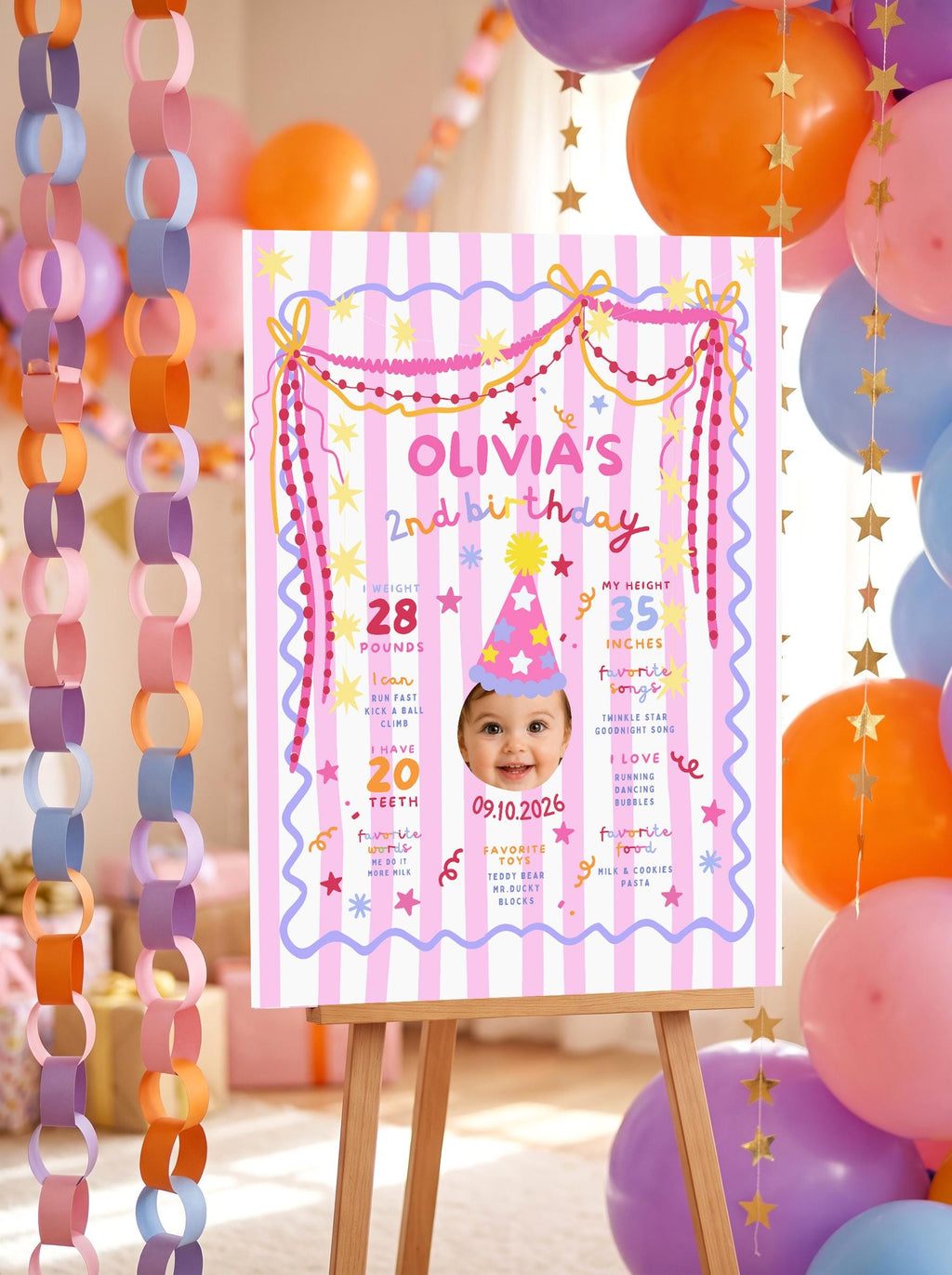 Colorful second birthday milestone sign with photo and favorite things for girls
